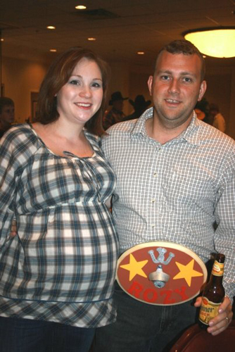 Sarah and her hubby Erik (and his massive belt buckle)